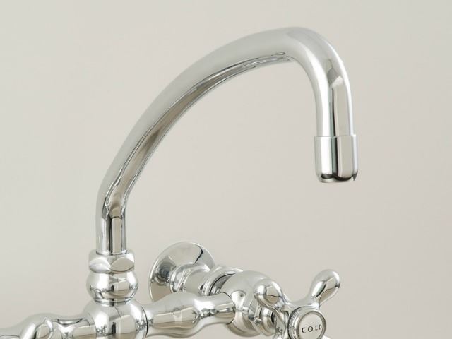 Picture of Strom Plumbing Wall-Mounted Kitchen Faucet with Arched Swivel Spout & X-Point Handles